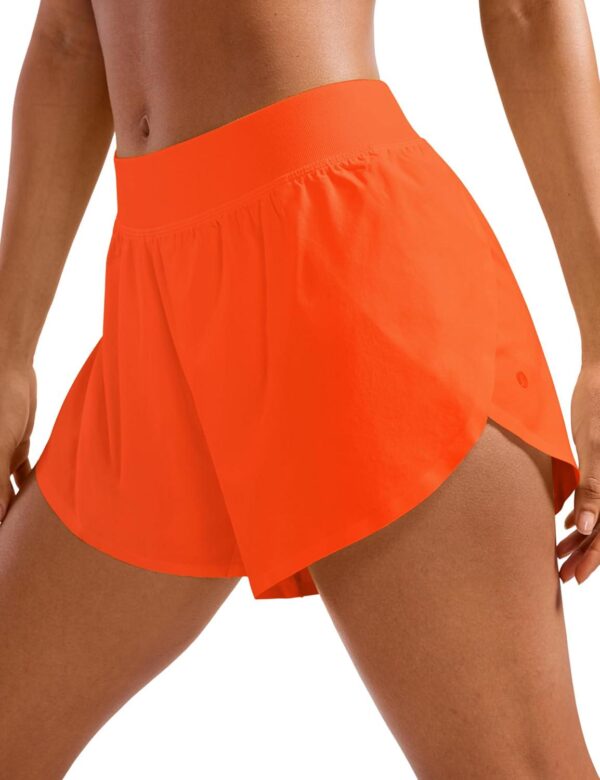 CRZ YOGA Mid Waisted Dolphin Athletic Shorts for Women Lightweight High Split Gym Workout Shorts with Liner Quick Dry